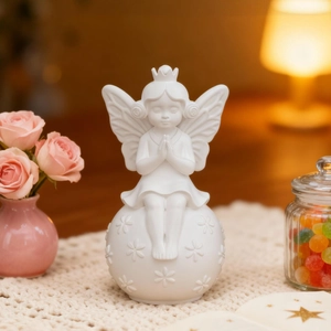 Elegant white angel figurine on floral sphere for home decor and DIY resin crafts