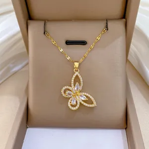 Elegant gold butterfly necklace with zircon micro-pave crystals and teardrop main stones