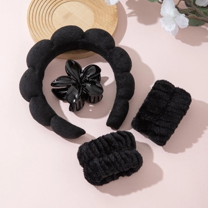 Black plush cloud headband with wristbands and flower clip for face washing and makeup