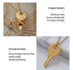 Macro detail of 18K gold plated titanium steel key and heart lock pendant necklace