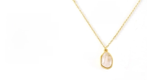 Detail view of water drop natural stone pendant with 18k gold plated steel chain
