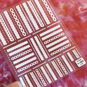 White 3D embossed sweater pattern nail art stickers with knit cable texture and dots