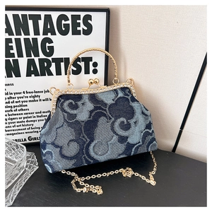Vintage denim handbag with auspicious cloud print and crystal gold clasp frame