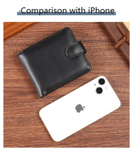 Men's retro PU leather wallet size comparison with a smartphone on wood surface