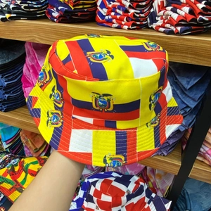 Detailed close-up of Ecuador flag bucket hat with yellow blue and red stripes and emblem