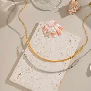 Minimalist 18K gold and silver plated stainless steel collar necklaces on stone plate