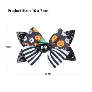 Detail of Halloween sequin bow hair clip with cartoon spider and pumpkin patterns