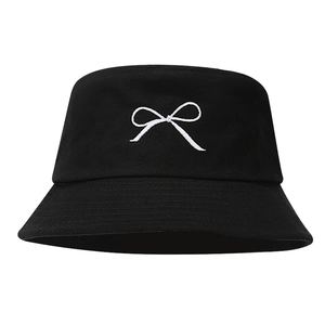 Classic black bucket hat with white bow embroidery on a minimalist round crown design