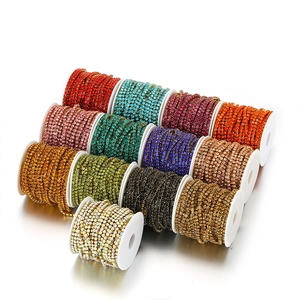 Colorful rhinestone claw chains on spools for DIY jewelry and clothing accessories