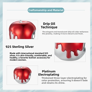 Detail of S925 sterling silver red enamel apple charm with platinum plated finish