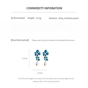 Detailed size specifications for vintage blue flower and pearl drop earrings measuring 6.7cm