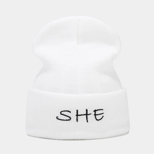 White knitted beanie with black SHE embroidery, warm winter headwear for street style
