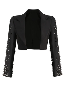 Detail of black cropped blazer with silver beaded sleeves and notch lapel design