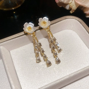 Sparkling crystal drop tassel earrings with floral accents and silver needle posts