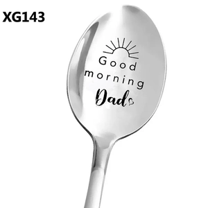 Close-up of engraved 'Good morning Dad' stainless steel long handle spoon