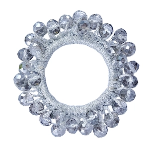 Detailed view of grey woven elastic hair tie featuring radiant faceted crystal beads