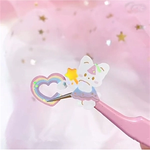 Cute cartoon cat sticker with rainbow heart and pink tweezers on a dreamy background