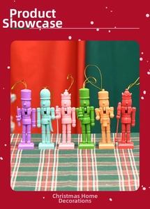 Detailed view of six colorful 13cm wooden nutcracker soldiers with gold hanging strings