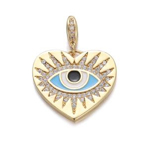 Golden heart-shaped evil eye pendant necklace with blue enamel and sparkling zirconia
