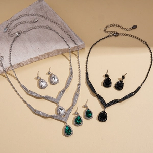 Vintage teardrop jewelry set with crystal necklaces and matching earrings in three colors