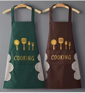 Waterproof aprons in green and brown with hand-wipe towels and cooking icons
