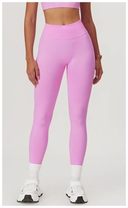 Detail view of high-waisted seamless peach lift yoga pants with wide ribbed waistband