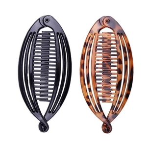 Two-piece set of banana hair clips in classic black and elegant tortoiseshell finish
