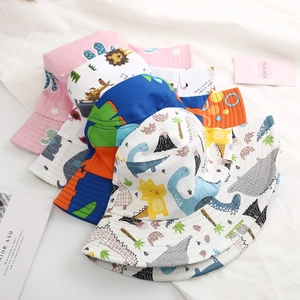 Detailed close-up of various colorful cartoon printed sun bucket hats for babies