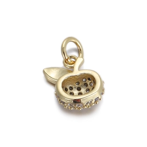 Detail of 14k gold-plated apple pendant with cubic zirconia stones and hollow design