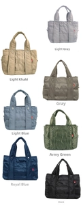 Quilted nylon tote bags shown in seven different colors for short-distance travel