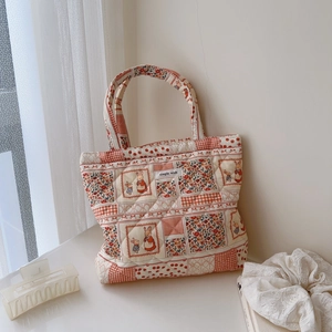 Quilted floral cotton tote bag with vintage patchwork patterns and cute rabbit design