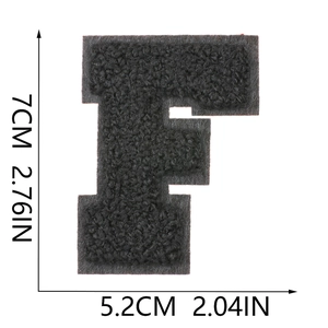 Detail of 7cm black chenille letter F patch with embroidery texture and dimensions