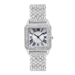 Detailed close-up of a silver rhinestone watch with blue Roman numerals and square dial