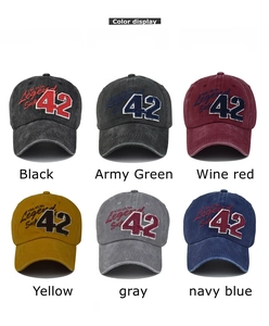 Multiple colors of washed baseball caps with number 42 and Legend embroidery detail