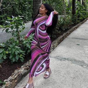 Floral mesh long dress with geometric print and waist tie shown in garden walk