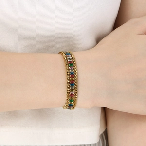 Detailed view of an 18K gold plated stainless steel bracelet with colorful zircon stones