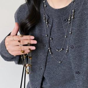 Tiger eye beaded pearl necklace set in layered style with gold and silver chains