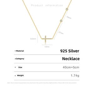 Detail showing 925 sterling silver 18K gold cross pendant with cubic zirconia stones
