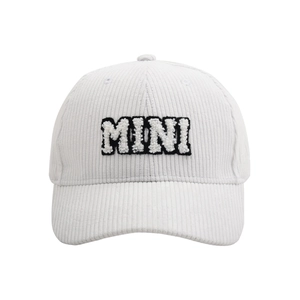 Detailed close-up of white corduroy baseball cap with MINI towel embroidery letters