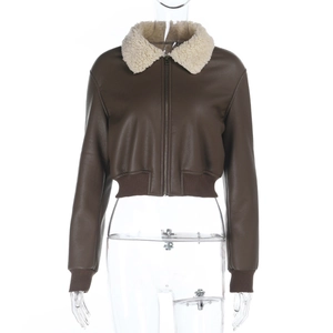 Detail of the brown faux leather jacket featuring a white shearling collar and zipper