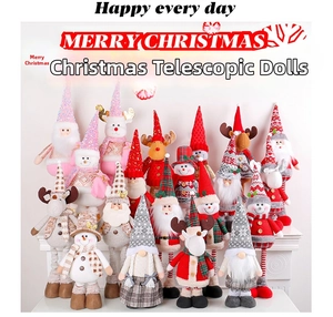 Detail of assorted plush telescopic Christmas dolls including Santa Snowman and Reindeer