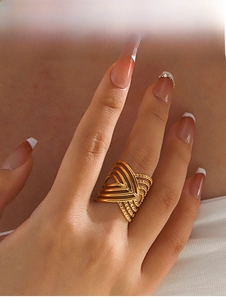 Detailed close-up of 18K gold plated wide crisscross ring with layered geometric design