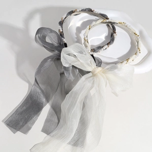 Vintage pearl headband with mesh ribbon bow streamers in grey and white colors