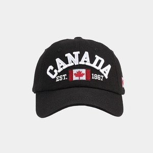 Detailed view of high-quality CANADA embroidery and flag on a black cotton baseball cap