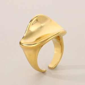 Detailed view of an 18K gold-plated stainless steel ring with elegant wavy curves