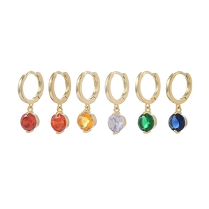 Set of three gold hoop earrings with multi-colored cubic zirconia charms on white background