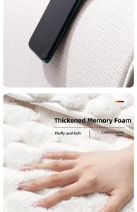 Detail of white memory foam bath mat showing deep hand pressure for soft rebound performance