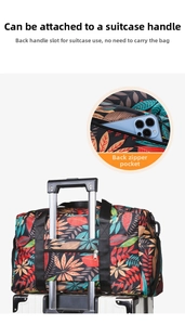 Detail of travel tote showing back luggage strap and hidden zipper pocket for phone