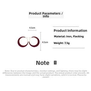 Detail of 4.5cm burgundy flocked hoop earrings with 18K gold plating and velvet texture