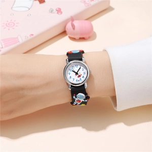 Wrist shot of kids astronaut watch with 3D rocket silicone strap and clear dial